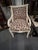 Glamorous cream tessellated bone armchair having curlicue arms and sensational new Scalamandre animal print upholstery....