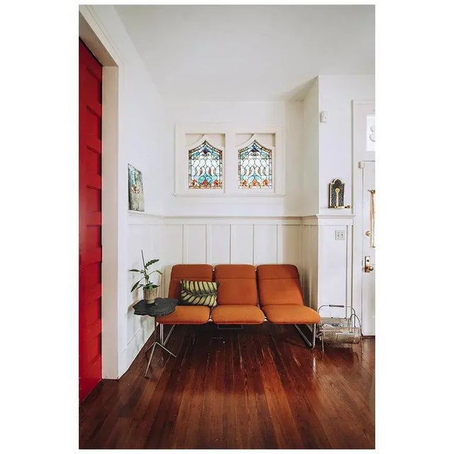 1970s tubular chrome sofa attributed to Pace Furniture and manufactured by Allsteel. Original orange tweed upholstery...