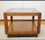 This 1960s Mid-Century Modern floating cube walnut side table, attributed to Adrian Pearsall, features a smoked glass top...