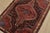 An authentic vintage tribal Zanjan rug hand-knotted with fine wool and natural dyes. This nomadic rug features a central...