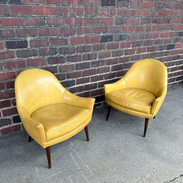Offered is a pair of original Paul McCobb lounge chairs featuring the clean, sculptural lines that have made his designs...