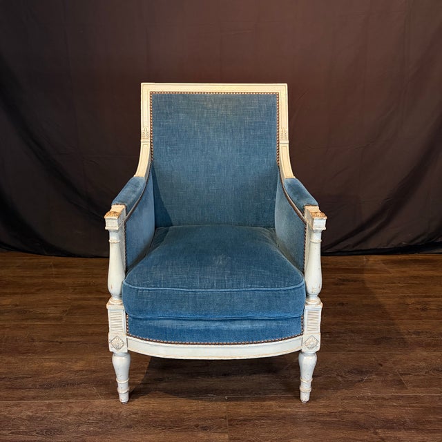 Pair of French neoclassical bergères with finely detailed square back frames in original softly painted pale grey finish,...