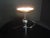 Chrome-plated table lamp from the Space-Age era. Fully functional and complete. Overall with slight signs of wear. A rare...
