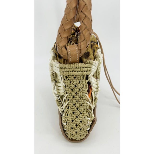 Vintage Roberto Cavalli Macrame Silk Drawstring Baguette in very good condition. Multi color leopard print silk lining...