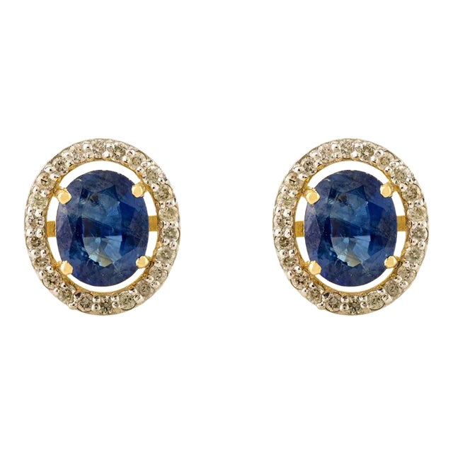 1.25ct Oval Cut Blue Sapphire Diamond Halo Statement Stud Earrings in 14k Gold- A Pair For Sale