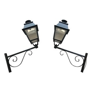 1950s Pair of Substantial Exterior Iron Lanterns on Brackets For Sale
