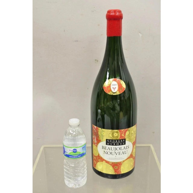 2009 George Duboeuf Beaujolais Nouveau Vintage Display Dummy Wine Champagne Bottle (Empty). Circa Late 20th Century....