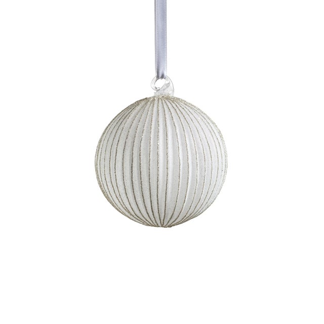 Enhance your holiday decor with these glass ball hanging ornaments. This set of ornaments features a sophisticated ribbed...
