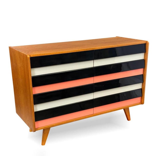 An iconic U 453 chest of drawers designed by Jiří Jiroutek for Interiér Praha, representing one of the most distinctive...