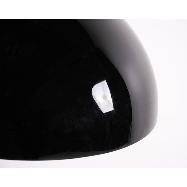 Skygarden 1 pendant designed by marcel wanders for flos in 2007. The lamp is finished in glossy black with a decorative...