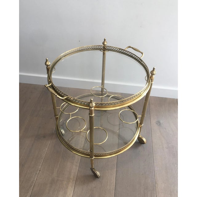 Attributed to Maison Jansen. Neoclassical brass round drinks trolley, French, circa 1940. Delivery can be less expensive...