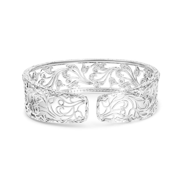 This resplendent openwork bangle cuff is a showpiece with 164 round white diamonds in an elegance-enhancing pave setting....