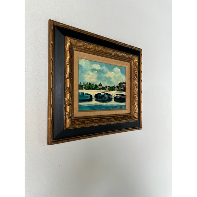 A Charming Vintage Impressionist Parisian river landscape scene oil painting. This is a well painted scene of a sunny day...