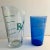 Wonderful set of two vintage glass items-a measuring beaker and a rare ultramarine blue Bromo Seltzer cup. The larger...