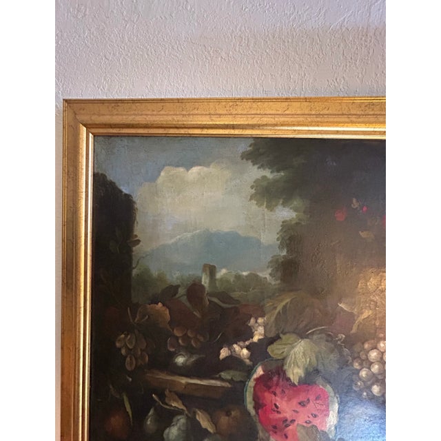Stand out 19th century still life oil painting on canvas having fruit and flowers in an outdoor setting illegibly signed...