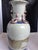 Bring a statement piece of traditional Asian artistry into your home with this striking antique Chinese porcelain vase....