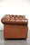 This very beautiful 2-seater cowhide leather sofa is crafted in a beautiful brown color and has a wonderful English...