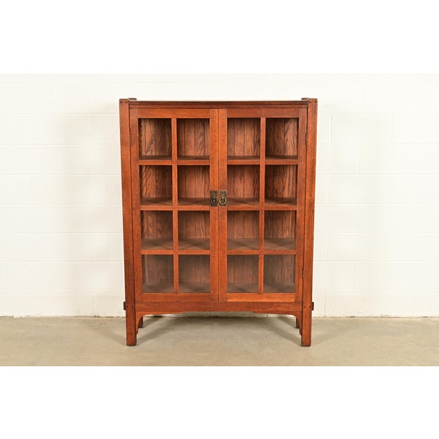 A beautiful antique Mission or Arts & Crafts period two-door bookcase or display cabinet By Charles Stickley USA, Circa...