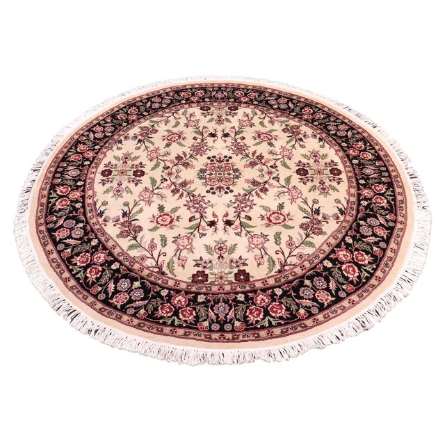 This hand‑knotted Pak Persian round rug showcases the finest expression of traditional Persian artistry. Each piece is...