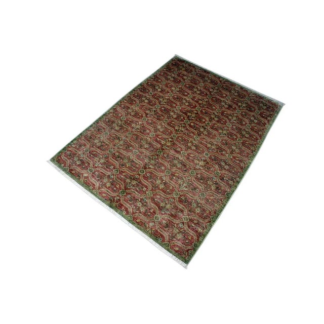 Designed with mesmerizing intricacy and gorgeous color palette, this hand-knotted masterpiece demonstrates the beauty and...