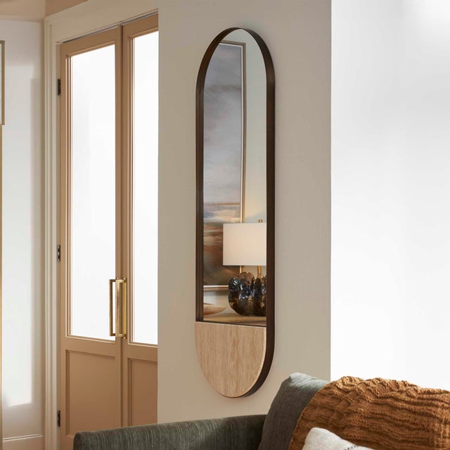 A True Study In Contrasts, This Striking Mirror Features A Substantial Travertine Base That Infuses A Raw, Earthy Elegance...