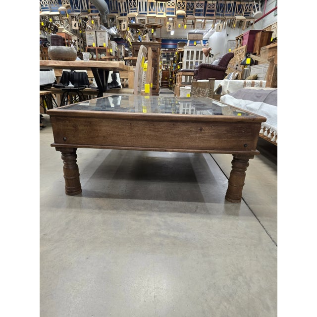 Crafted with an eye for rustic appeal and a touch of industrial elegance, this coffee table effortlessly anchors any...