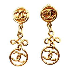 Chanel Vintage Gold Plated Round CC Twisted Cross Long Clip on Earrings, A Pair