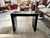 Extendable console table with metal frame and black lacquer finish, 1980s. modular structure consisting of a trestle base...