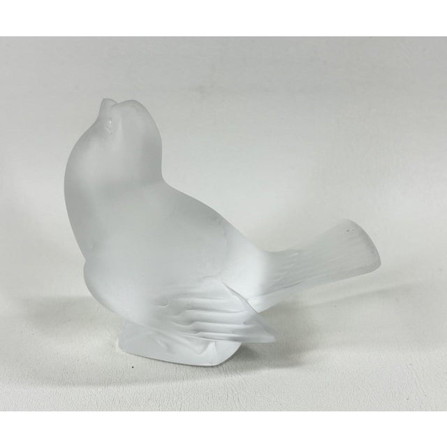 The Singing Sparrow (Moineau Coquet) - A Mid-Century Lalique Frosted Crystal Masterpiece Elevate your collection with this...