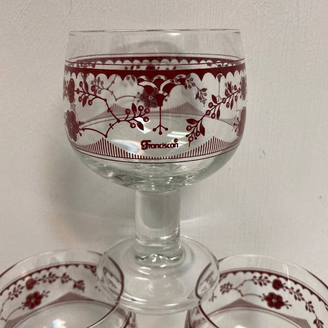 Set of 4 vintage water/wine goblets made in France by Franciscan. Burgundy floral pattern adorn these bo-ho chic design...