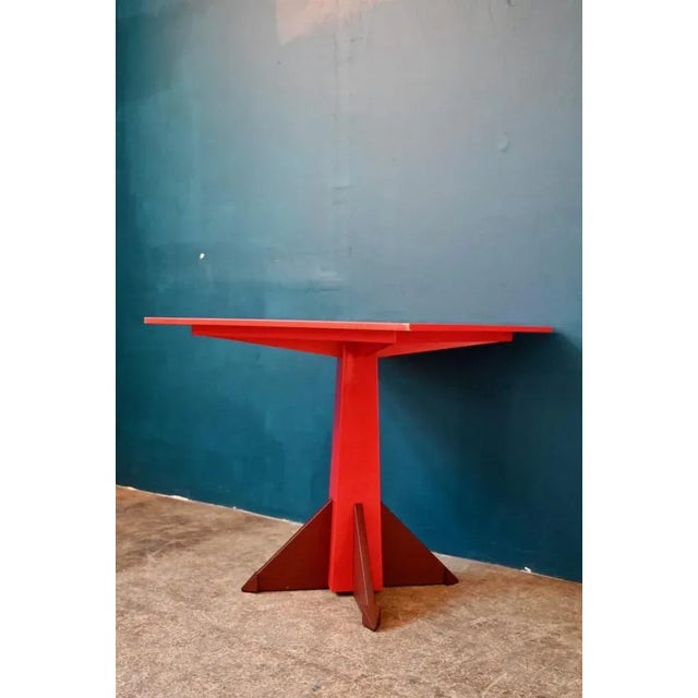 Sculptural and imprint of the madness of the Memphis current of the 80s, this dining table published by Kartell was...