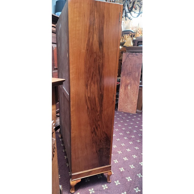 A nice Art Deco Burl Walnut Armoire from 1920s. Solid wood sides nicely built. Comes with a pole for hanging and three...