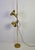 Brass adjustable floor lamp, germany, 1970s. This elegant vintage floor lamp features a slim vertical brass stem on a...