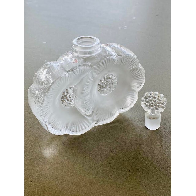 Bottle by René Lalique for Lalique, in Flawless conditions. Designed 1920 to 1949 This piece has an attribution mark, I am...