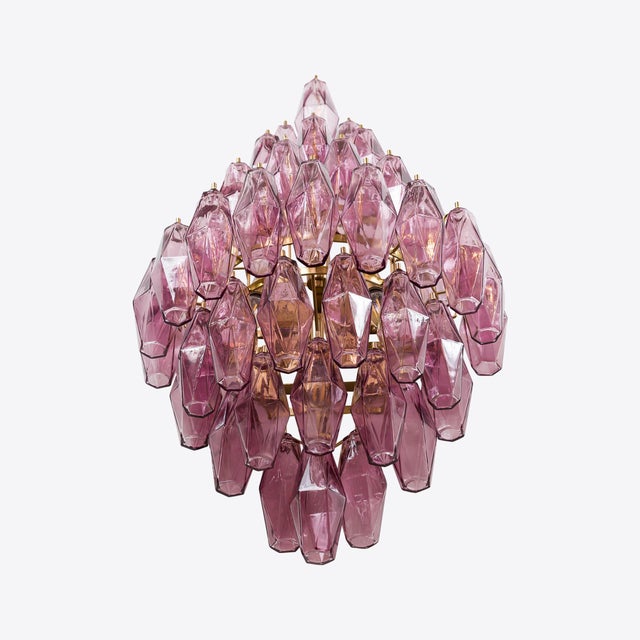A vintage inspired wall light formed from beautiful, coloured polyhedrons in Pink, Amber, Lilac and Smoked glass and...