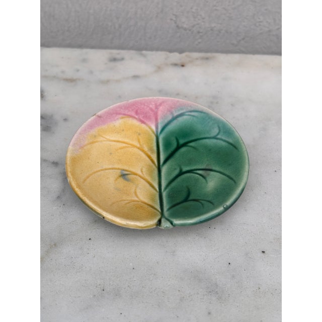Etruscan Majolica leaf butter pat signed circa 1890.