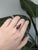 This stunning ring features a vivid 7.76-carat pear-shaped Rubellite Tourmaline, untreated and sourced from Brazil. Set in...