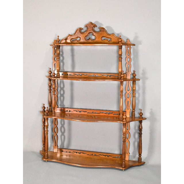 Antique French Shelving Unit 19th Century in Walnut Louis Philippe Style. The Walnut Shelving Unit / Etagere features four...