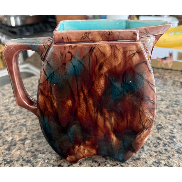 Antique Minton style poitcher with Blue interior.