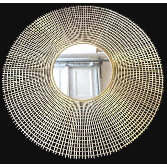 A striking large-scale Mid-Century Modern sunburst mirror featuring an intricate radial lattice constructed from...