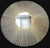 A striking large-scale Mid-Century Modern sunburst mirror featuring an intricate radial lattice constructed from...
