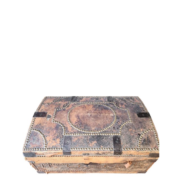 Rare and unique very old leather covered dome top steamer trunk with extensive brass studding, old iron hardware and lock,...