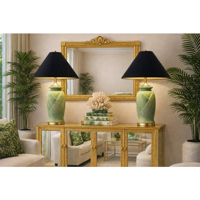 Offering an EXTRA-LARGE pair of vintage RESTORED plaster palm tree lamps, circa 1980s. These lamps were completely...