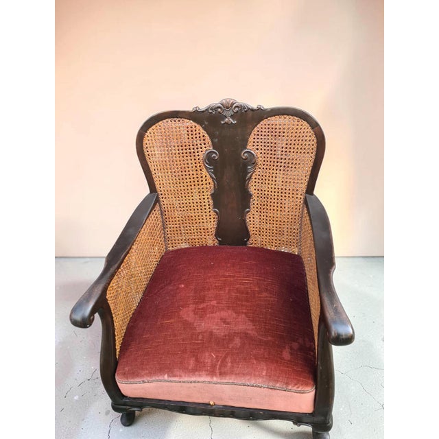 An elegant, original armchair from the late 19th century, designed in the Neorococo (Rococo Revival) style, characteristic...