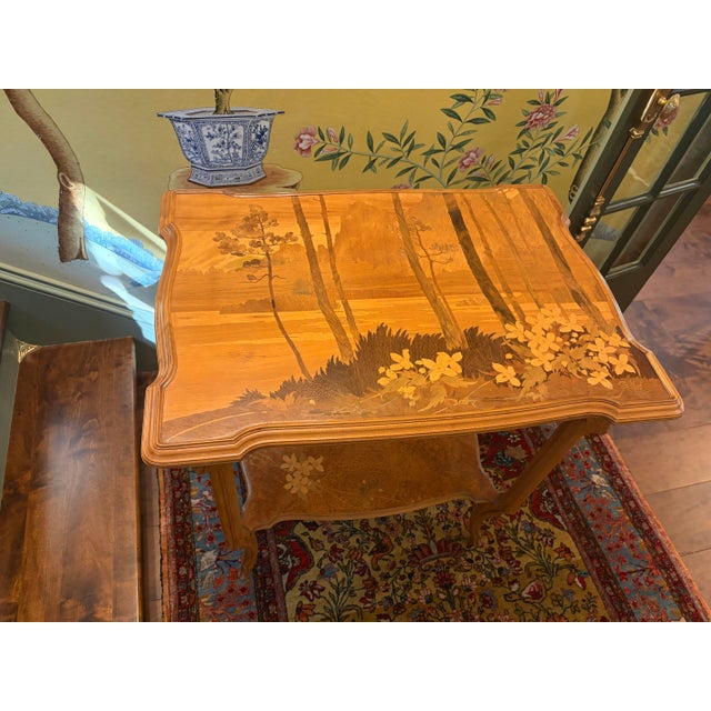 It is not very often you come across a work of this caliber and craftsmanship. What you have here is a lovely inlaid table...