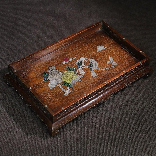 A beautifully crafted Chinese rectangular tray or display stand, likely made of Huali (rosewood). The piece features a low...