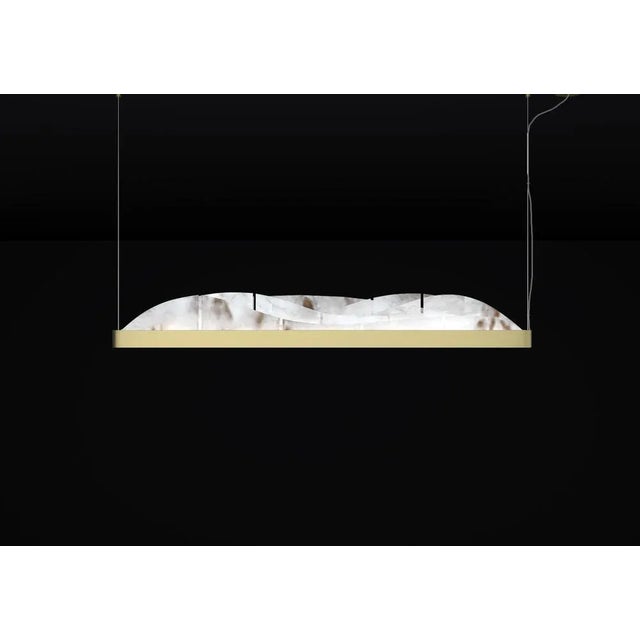 Giapeto brushed brass metal pendant lamp by alabastro italiano dimensions: d 5,5 x w 121 x h 16 cm. Materials: white...