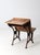 Early 20th century antique school desk by American Seating Company featuring a sculptural bent steel base with a solid...