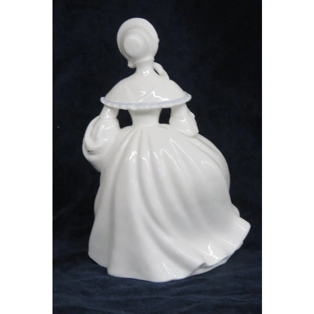 This gorgeous Figurine is made out of bone china / porcelain. This wonderful figurine is stamped as having been made in...