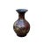 This magnificent vase is a stunning example of traditional craftsmanship, meticulously decorated with intricate details...